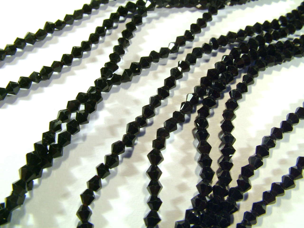 Strand Faceted Bicones 3x3mm Black